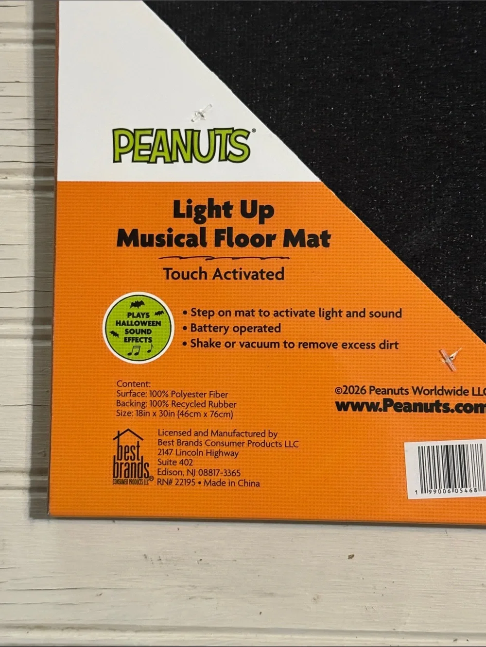 Musical Peanuts Halloween Doormat with Snoopy in a jack o lantern with Woodstock